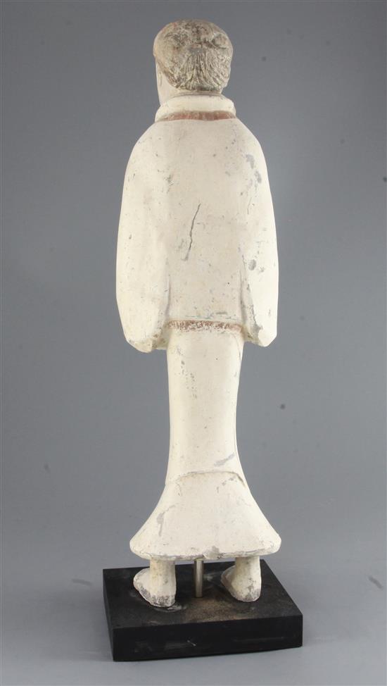 A tall Chinese pottery figure of a Court Attendant, Xian, Western Han dynasty (206BC - 8AD) 57.5cm, modern stand
